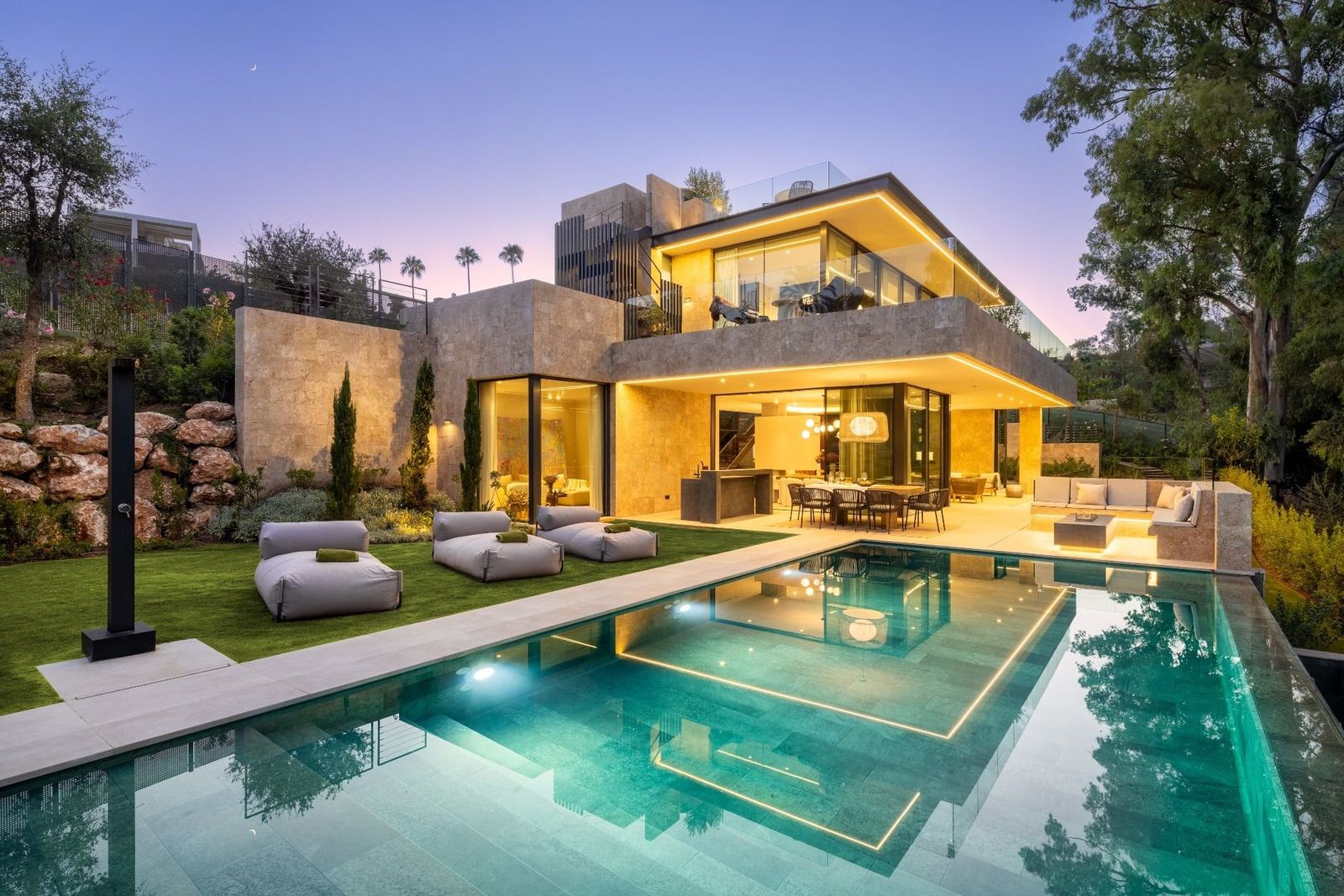 Premium villa with a swimming pool at dusk